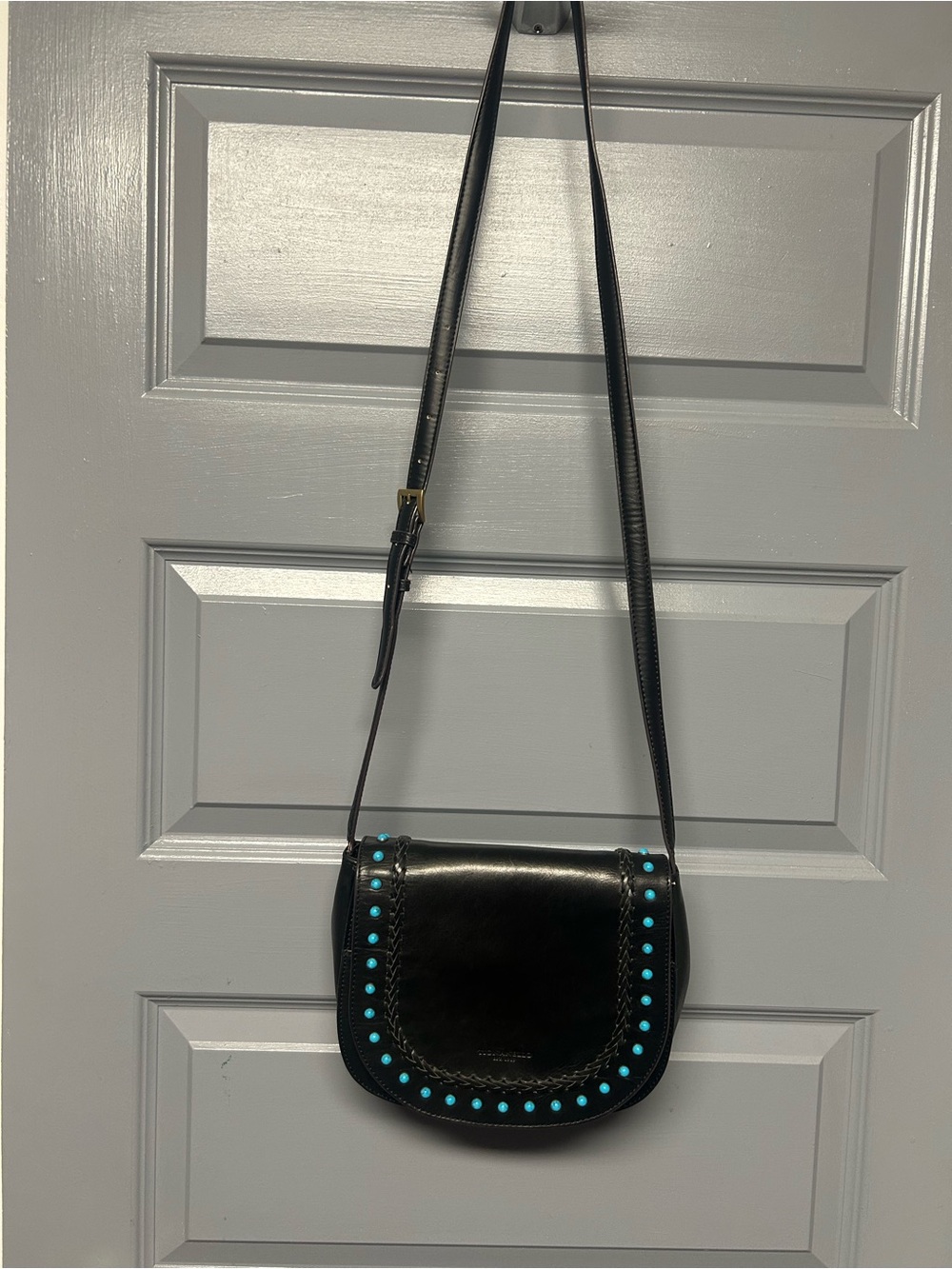 TIGNANELLO MOJAVE SADDLE BAG CROSS BODY PURSE. Some condition issues but good